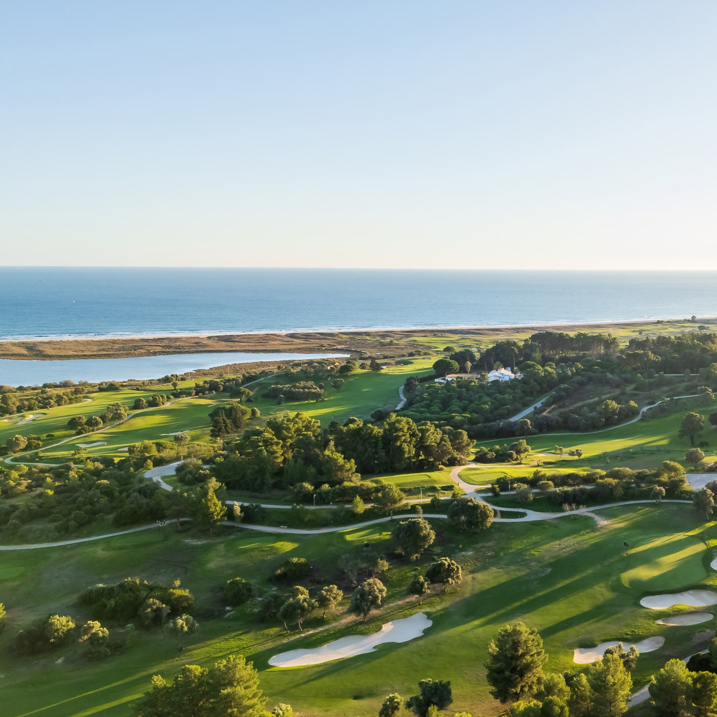 Aerial view of parkland, lakeside and coastal fairways at Palmares Golf near Lagos, Algarve